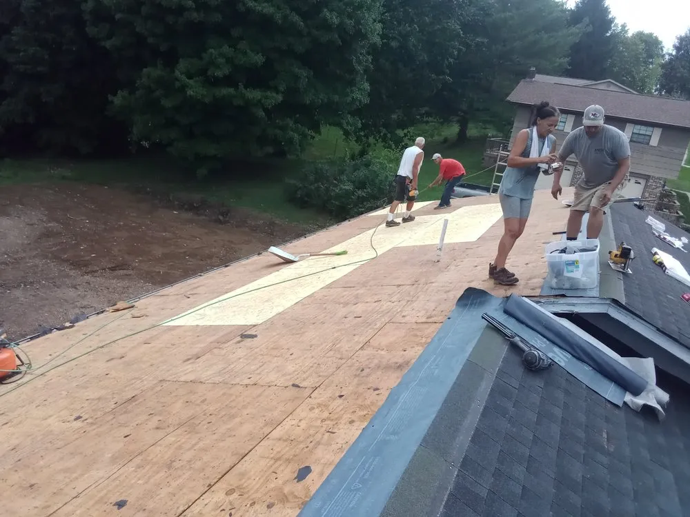 Slide of Dee's Roofing and Seamless Gutters