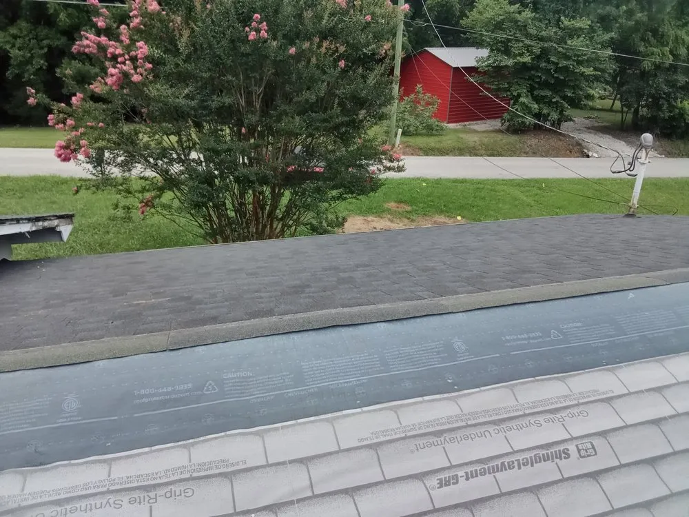 Slide of Dee's Roofing and Seamless Gutters