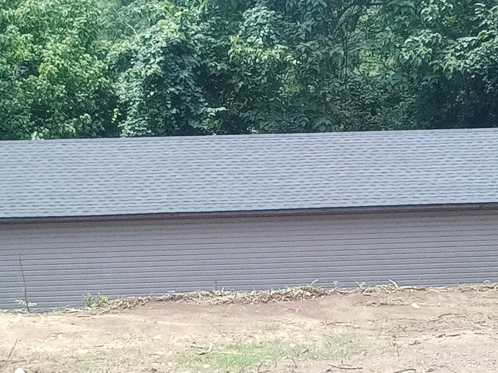 Slide of Dee's Roofing and Seamless Gutters