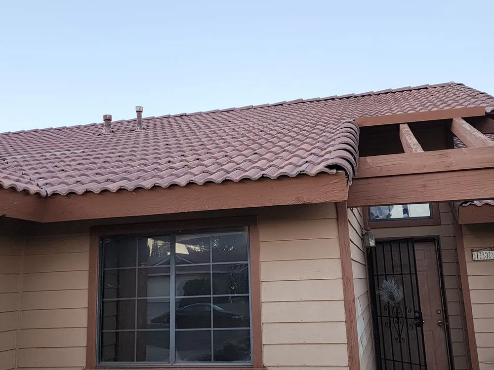 Slide of Defender Roofing 