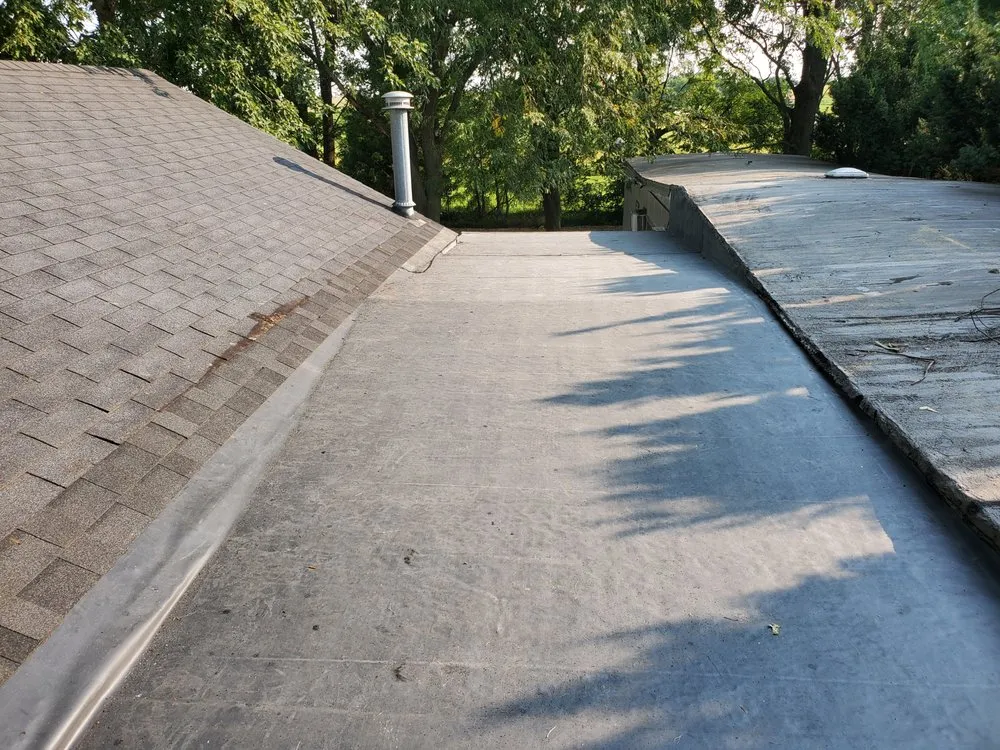 Slide of Dekalb Roofing