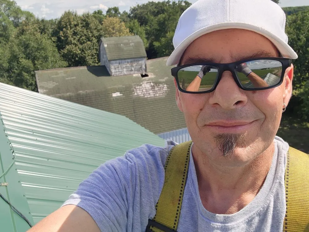 Slide of Dekalb Roofing