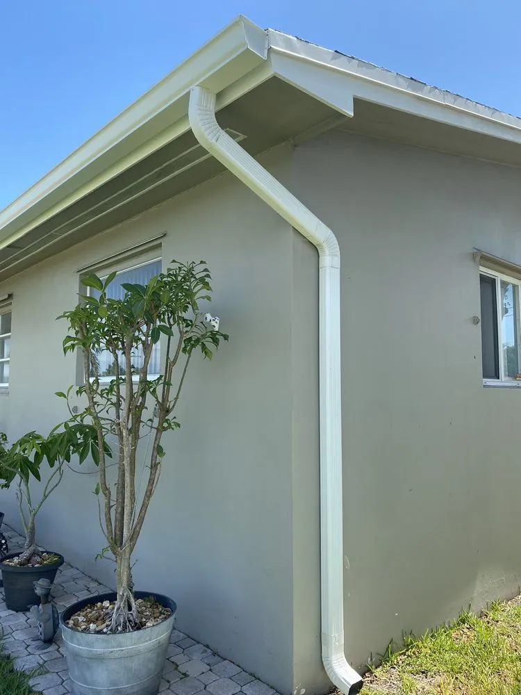 Slide of Del Toro Rain Gutters and Roofing