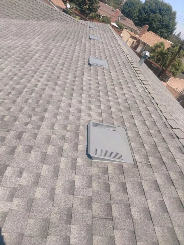 Slide of Delcid Roofing