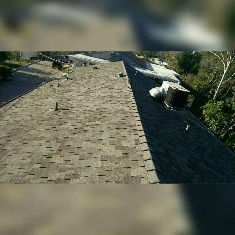 Slide of Delcid Roofing