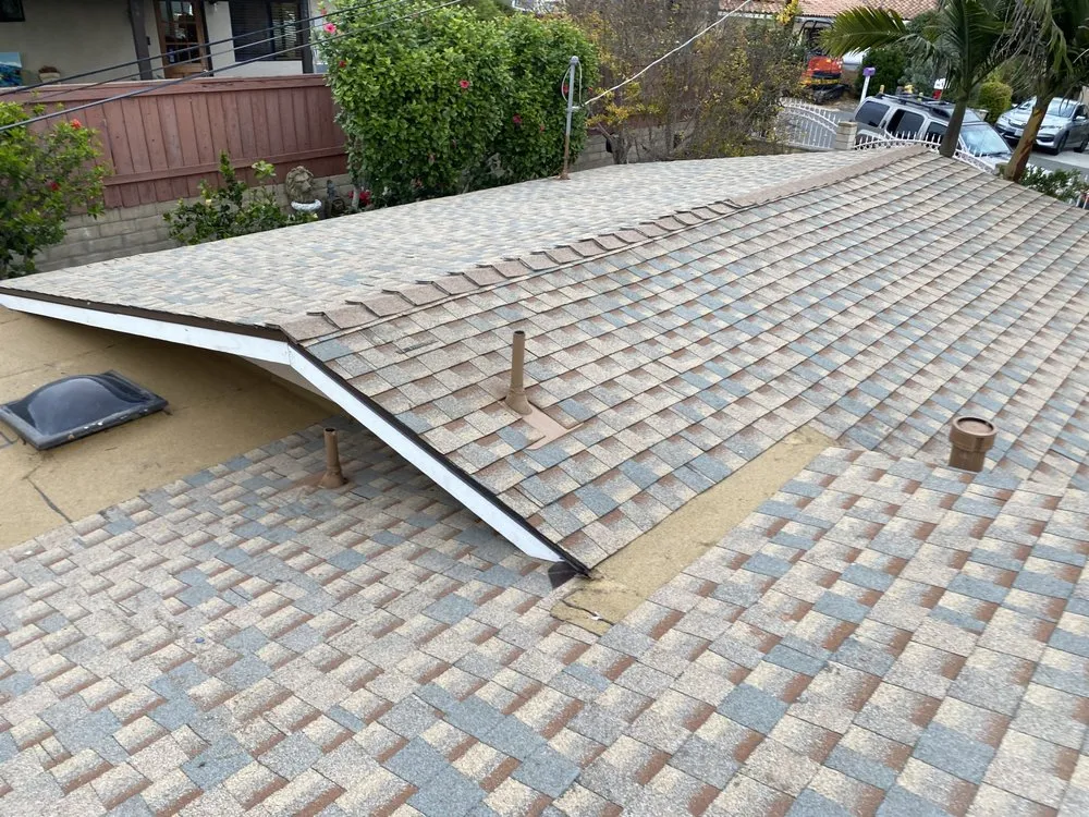 Slide of Delino’s Roofing & Remodeling