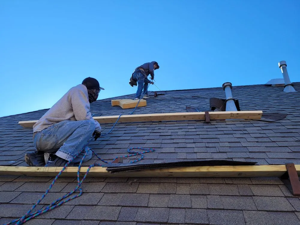 Slide of Del's & Son Roofing