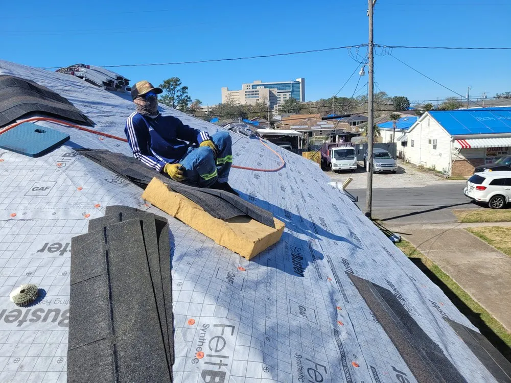 Slide of Del's & Son Roofing