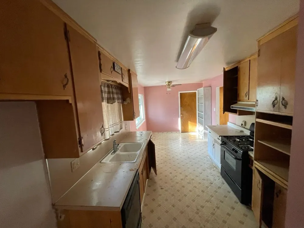 Slide of Delta Bay Builders and Roofing