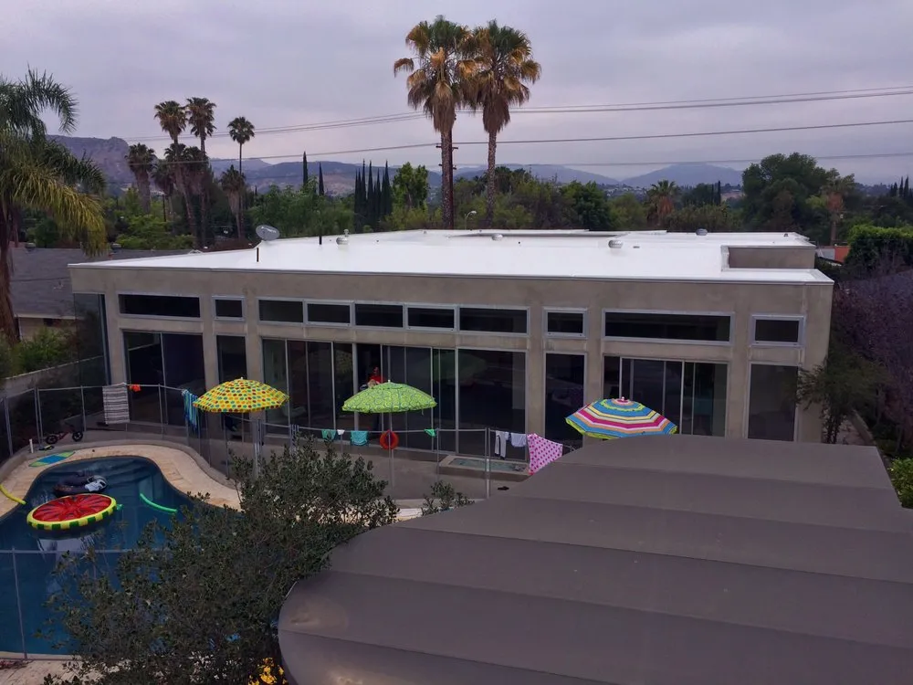 Slide of Delta Roofing