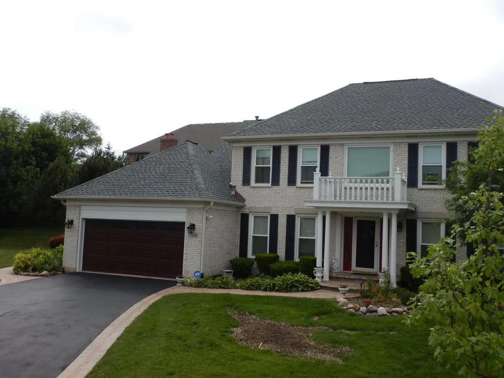 Slide of Deluxe Roofing