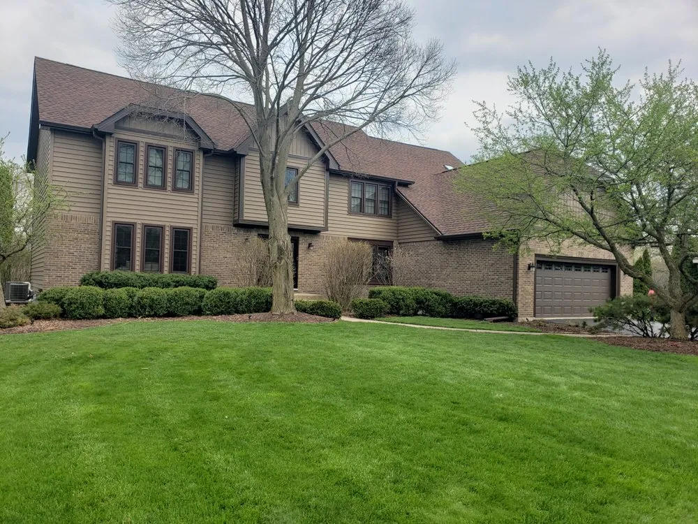 Slide of Deluxe Roofing