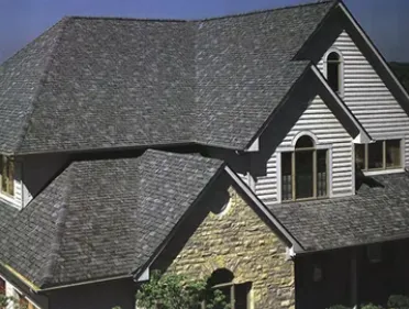 Slide of Deluxe Roofing