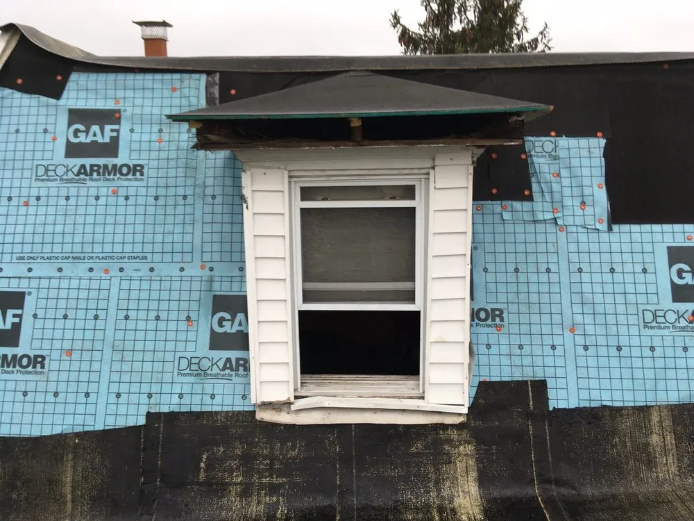 Slide of DeMarco Family Roofing