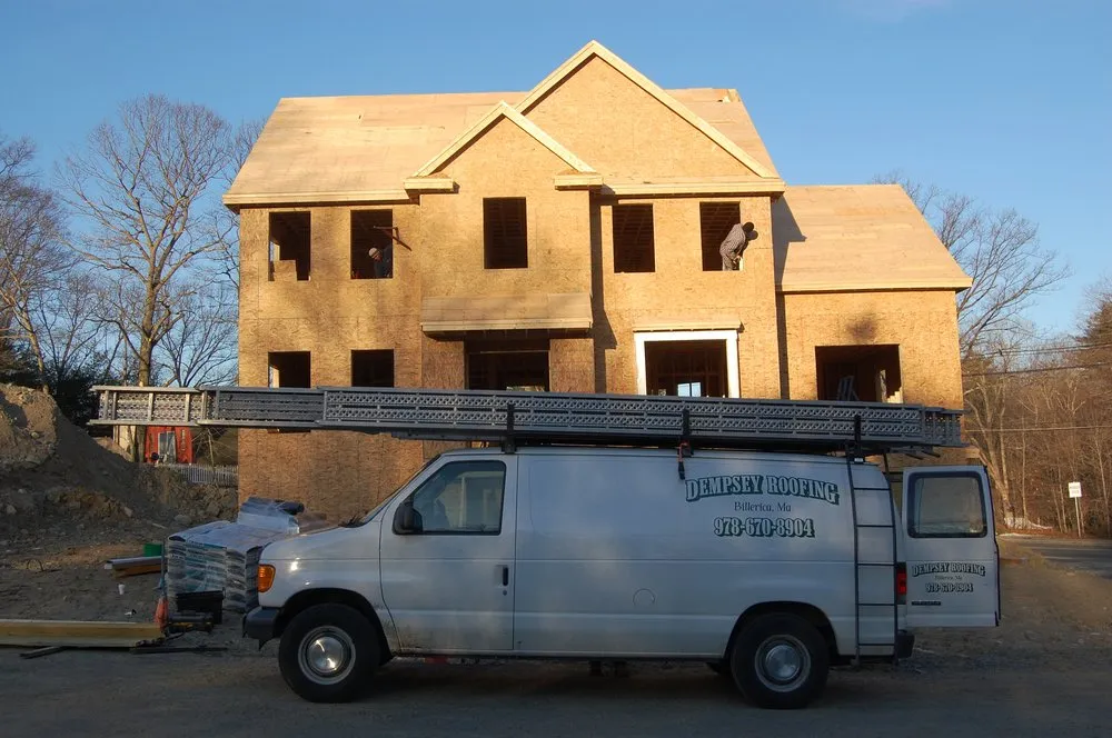 Slide of Dempsey Roofing