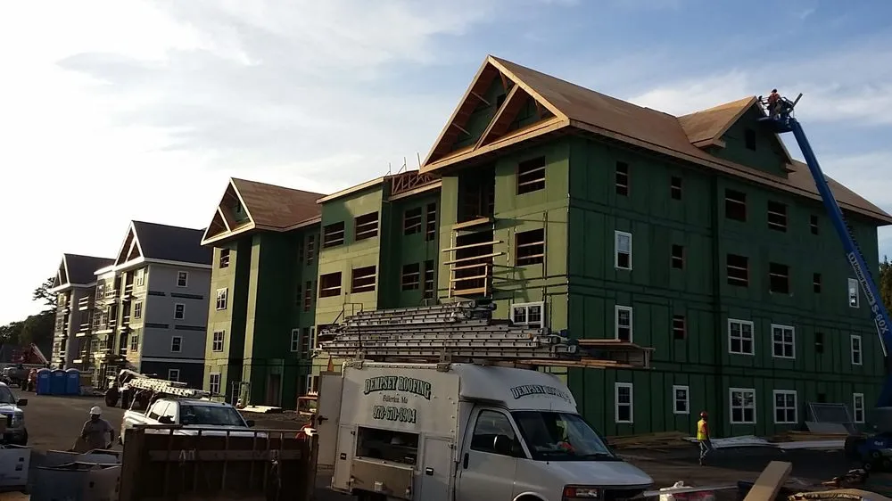 Slide of Dempsey Roofing