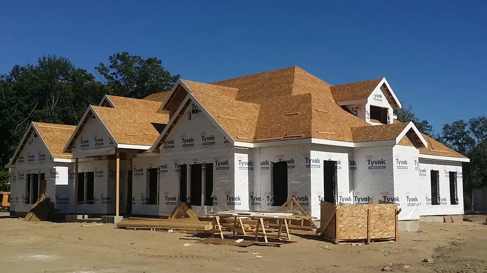 Slide of Dempsey Roofing