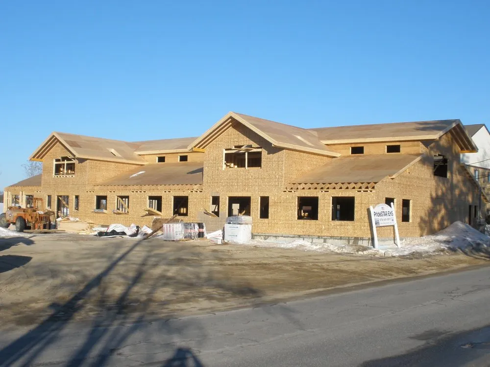 Slide of Dempsey Roofing