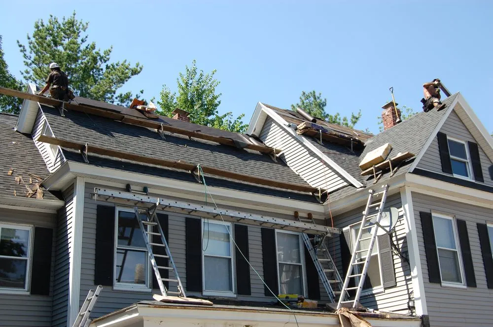 Slide of Dempsey Roofing