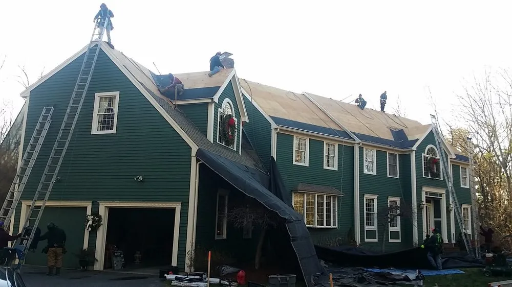 Slide of Dempsey Roofing