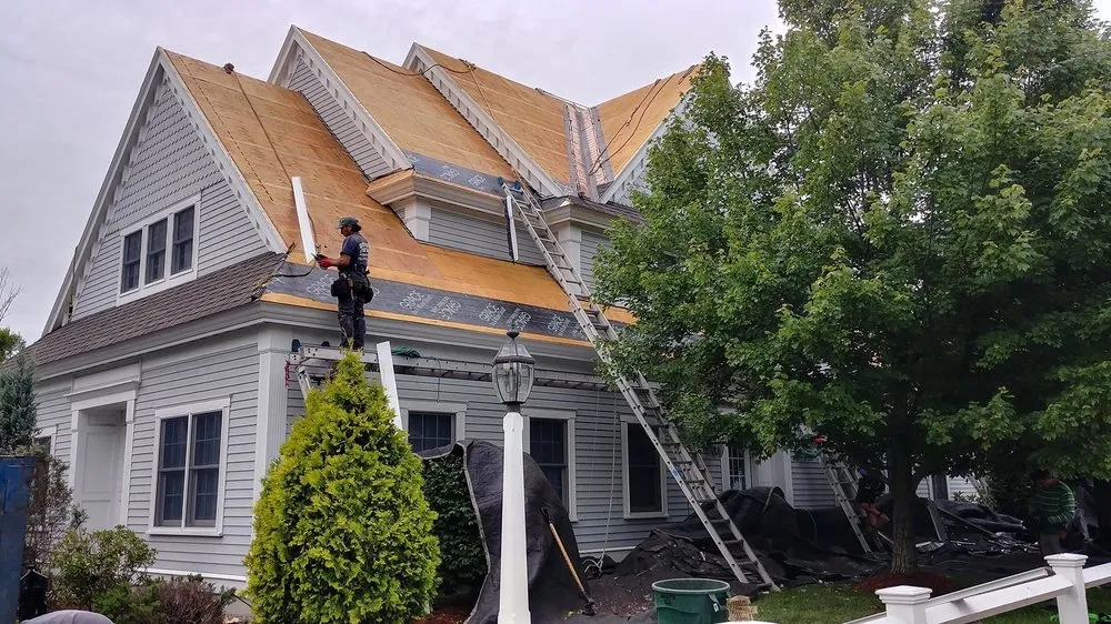 Slide of Dempsey Roofing