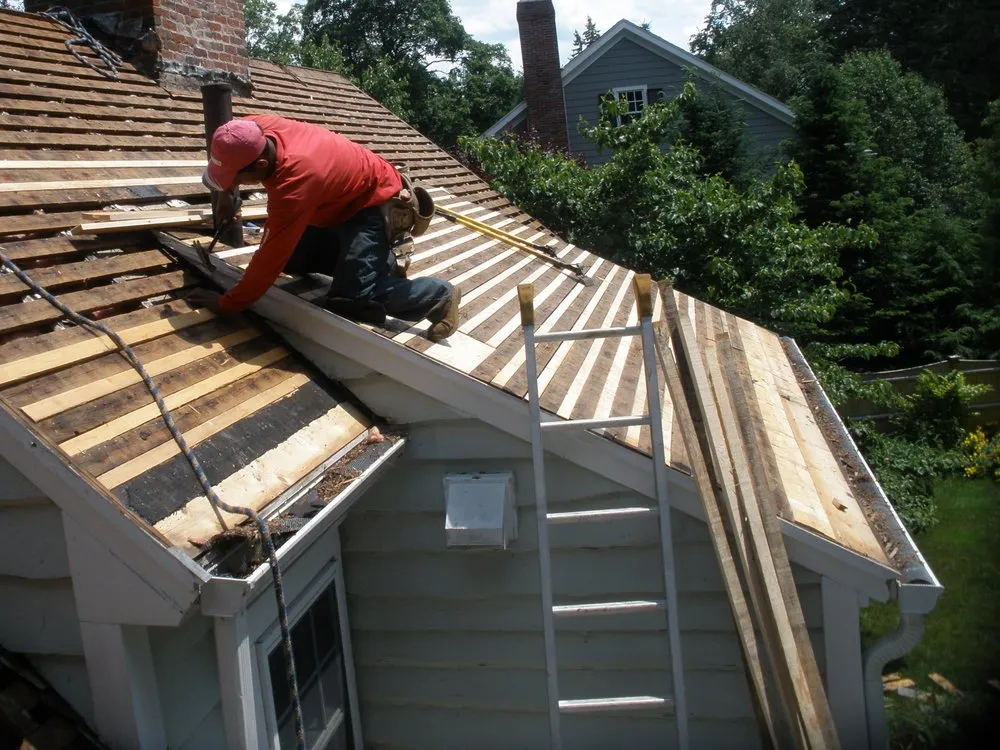 Slide of Dempsey Roofing