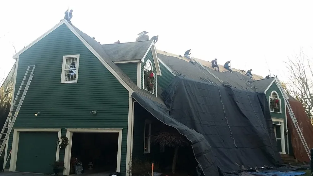 Slide of Dempsey Roofing