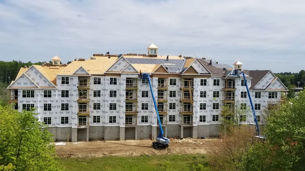 Slide of Dempsey Roofing