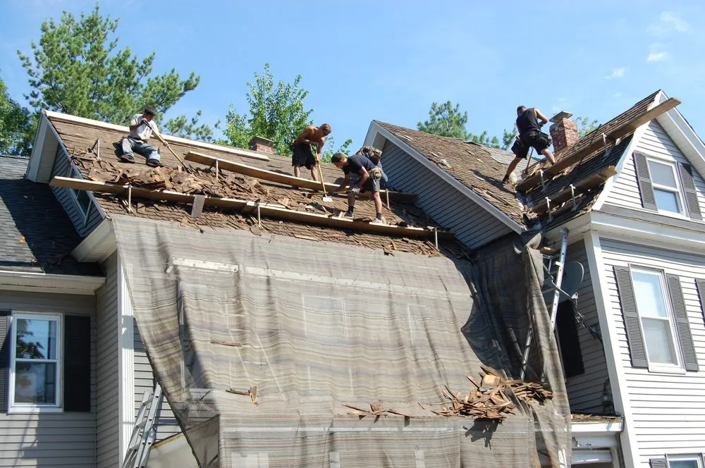 Slide of Dempsey Roofing