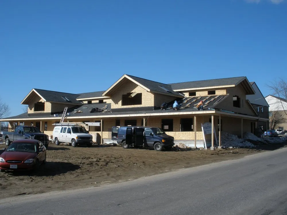 Slide of Dempsey Roofing