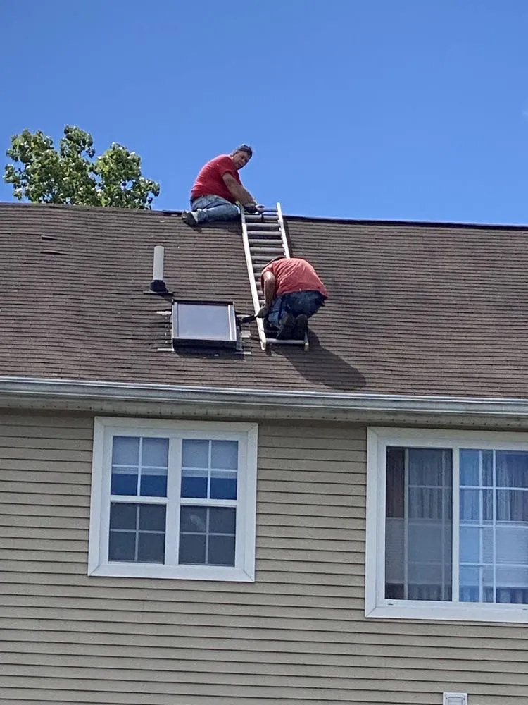 Slide of DeMuro Roofing Company