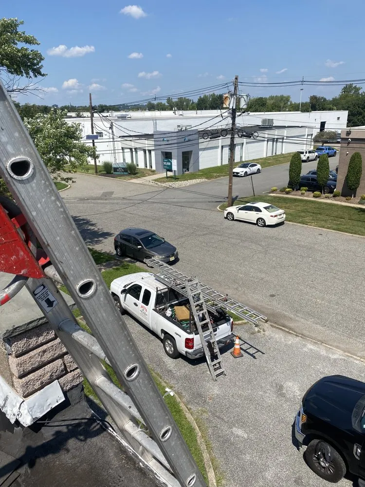 Slide of DeMuro Roofing Company