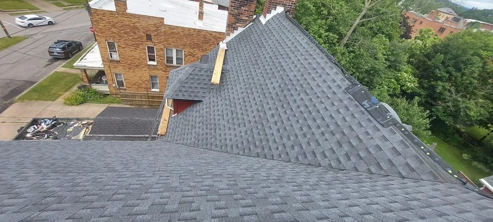 Slide of Den Roofing & Siding