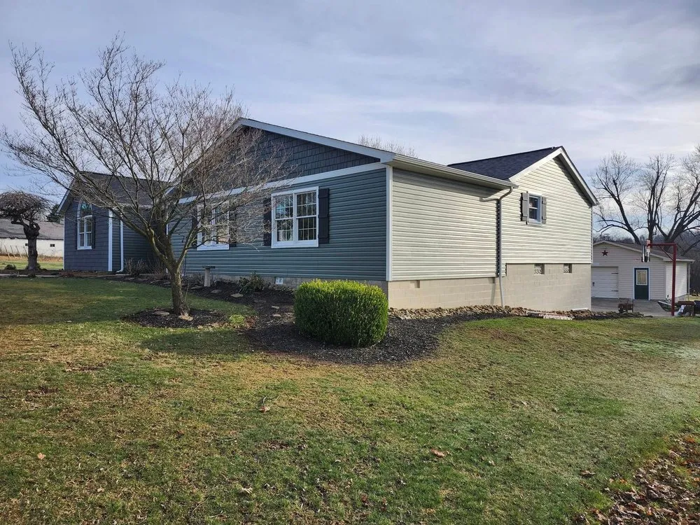 Slide of Den Roofing & Siding