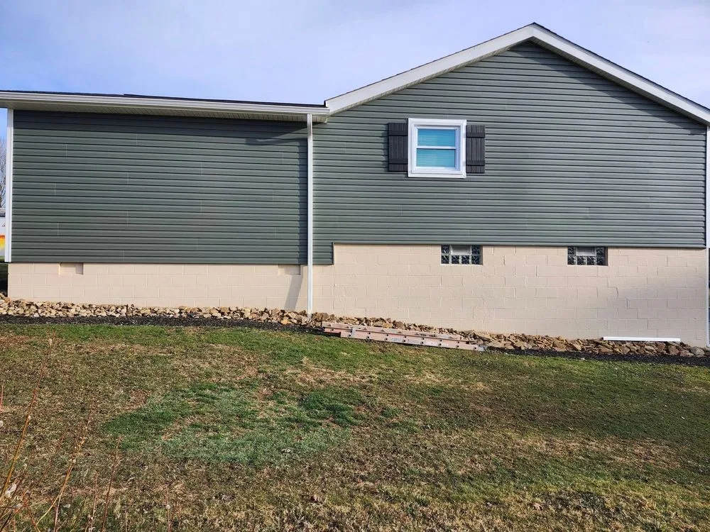 Slide of Den Roofing & Siding