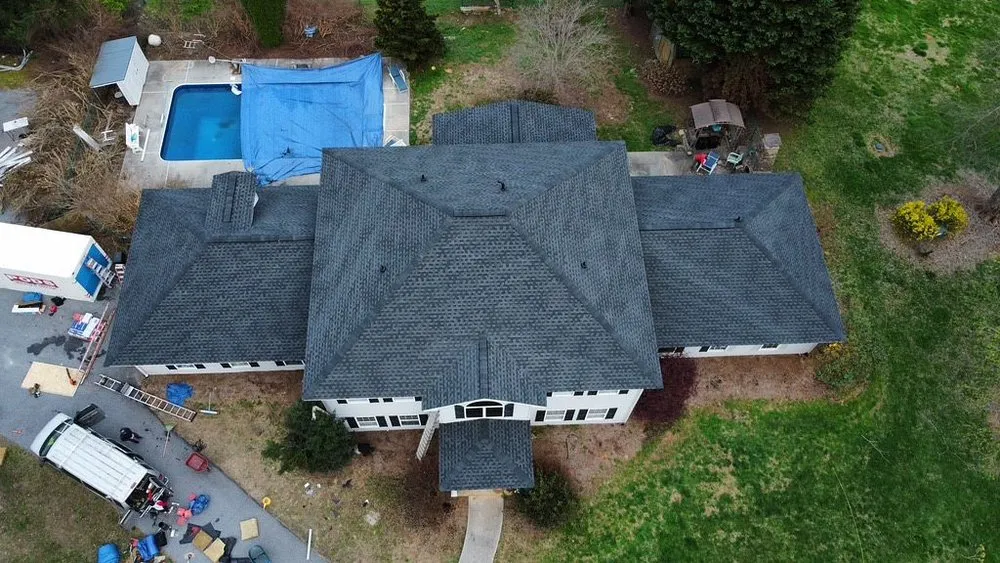 Slide of Denali Roofing and Restorations