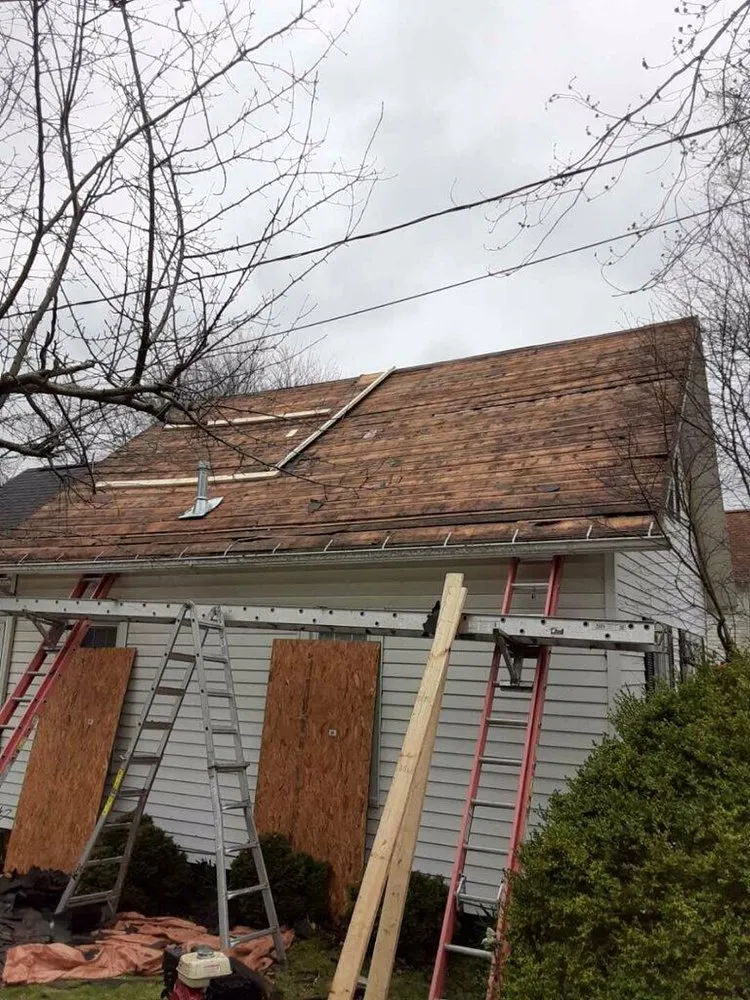 Slide of Denney’s Roofing