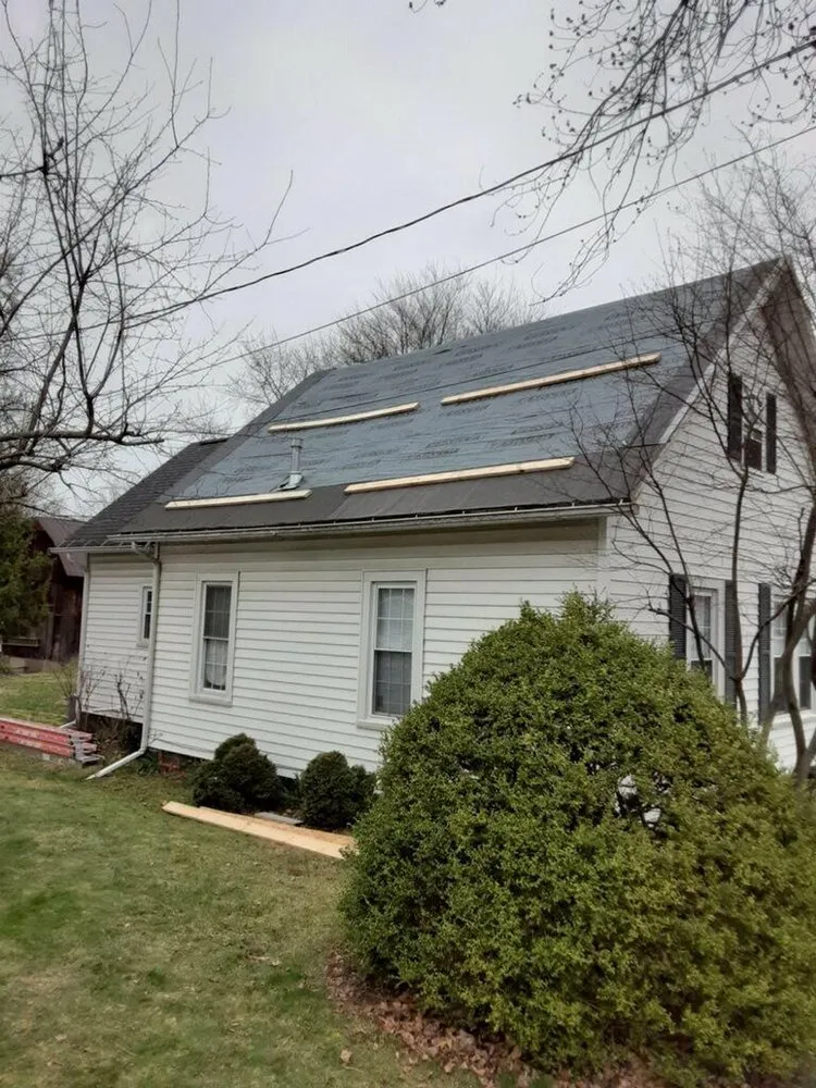 Slide of Denney’s Roofing