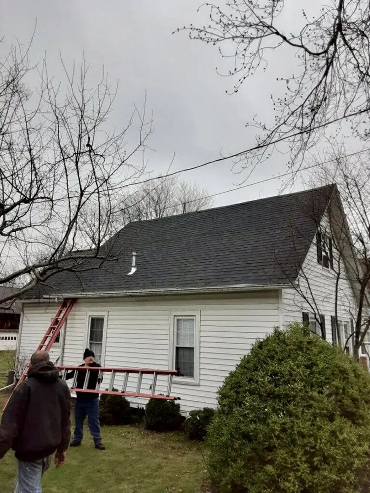 Slide of Denney’s Roofing