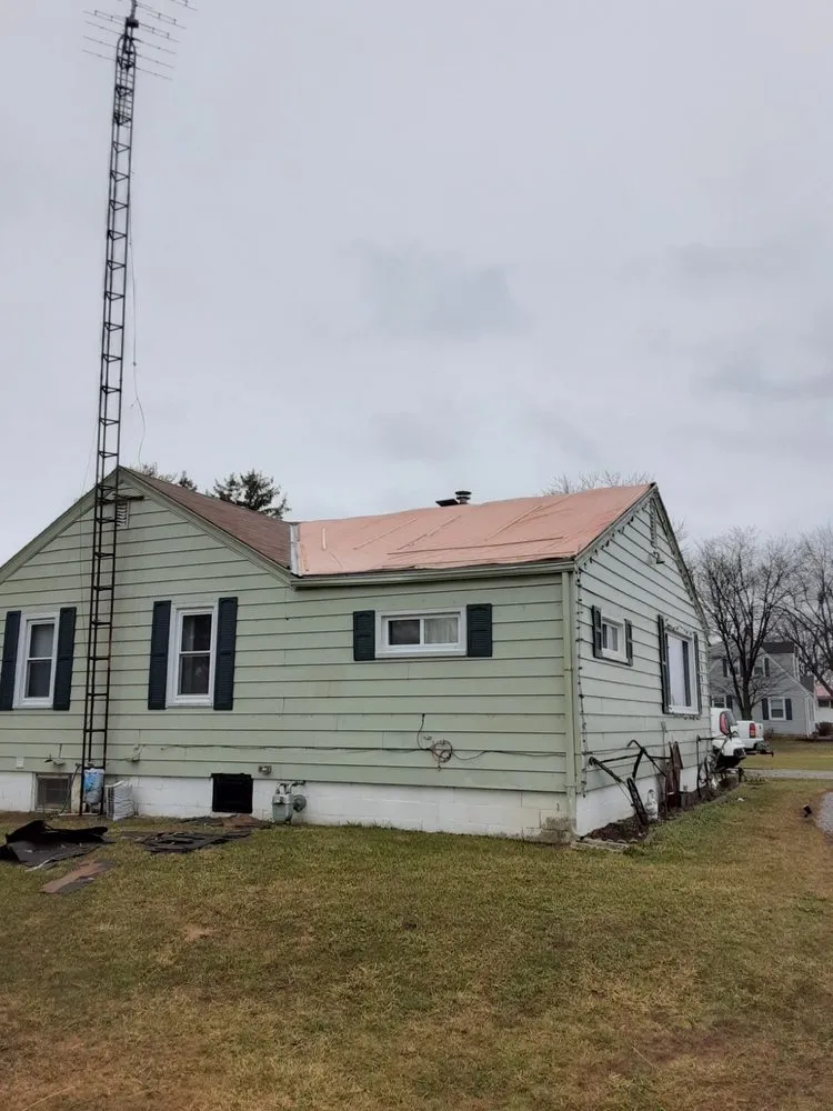 Slide of Denney’s Roofing