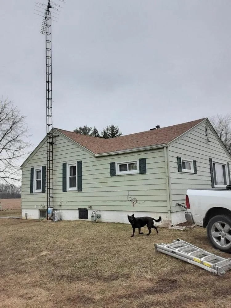 Slide of Denney’s Roofing