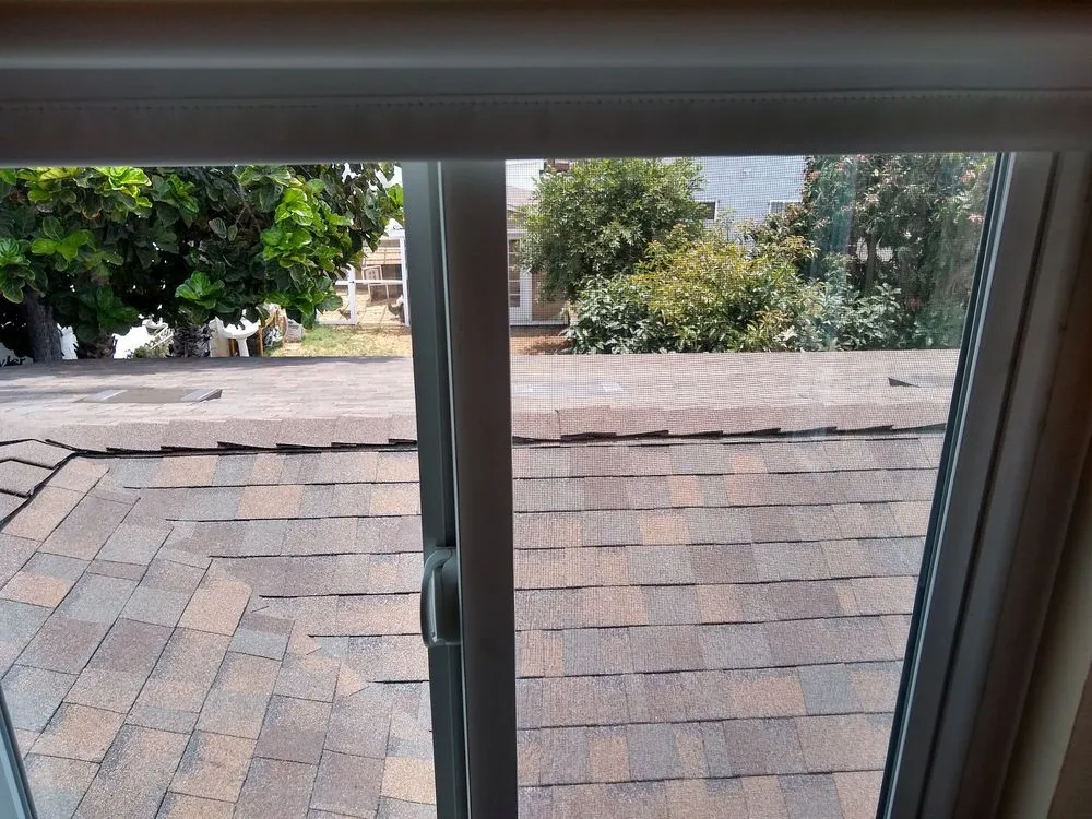 Slide of Dennis Cook Roofing