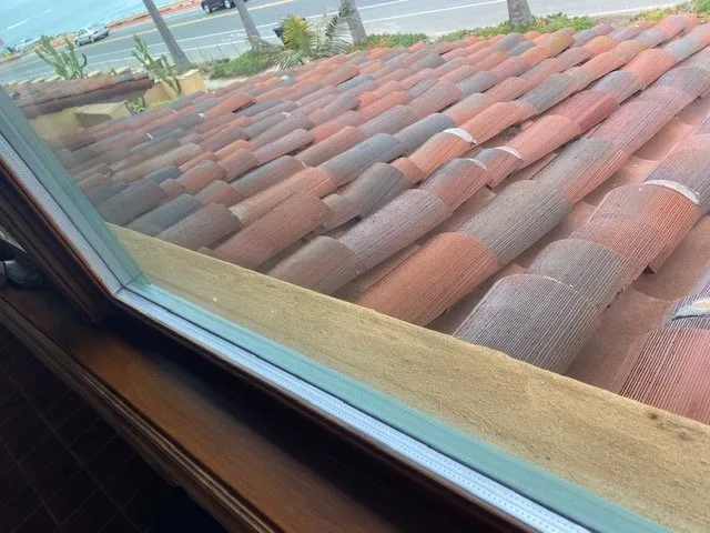 Slide of Dennis Cook Roofing