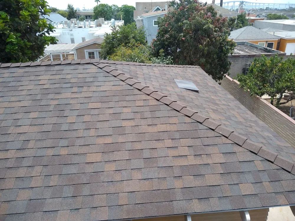 Slide of Dennis Cook Roofing