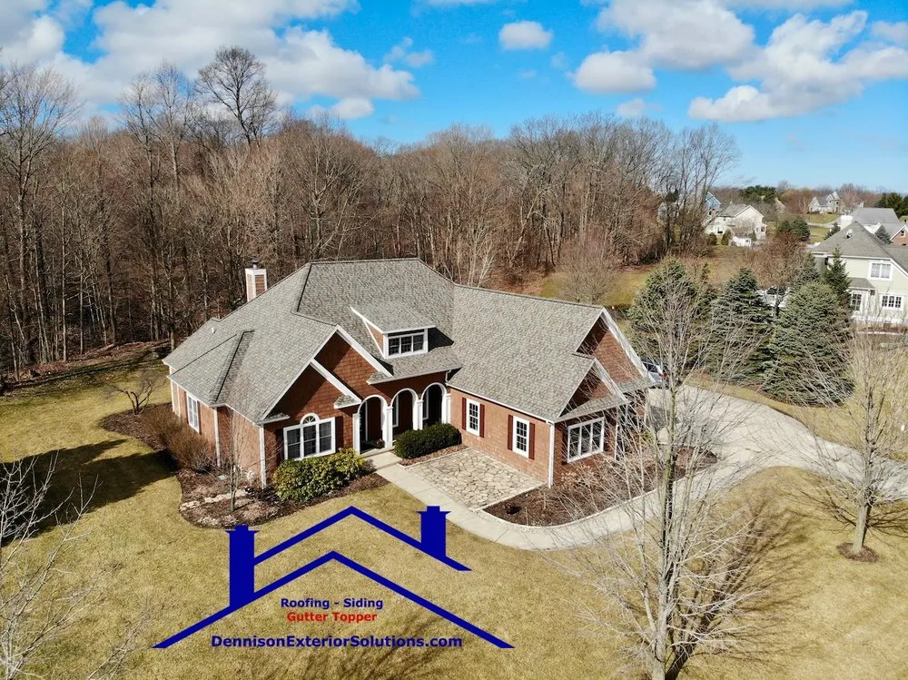 Slide of Dennison Roofing & Gutter Toppers