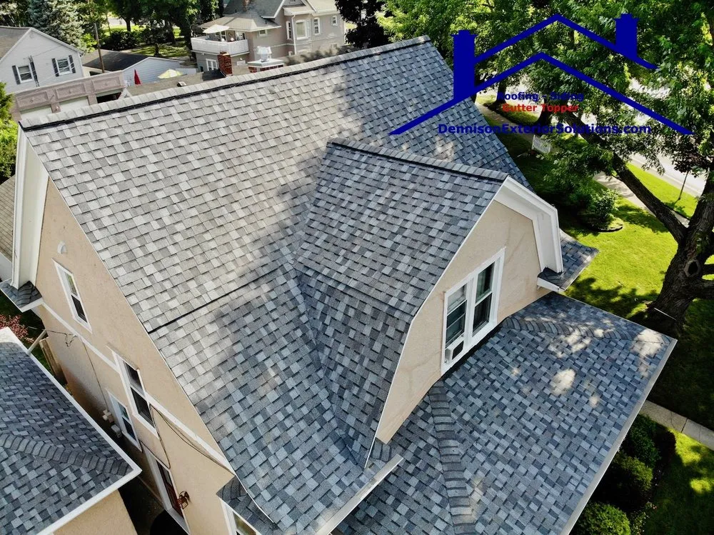 Slide of Dennison Roofing & Gutter Toppers