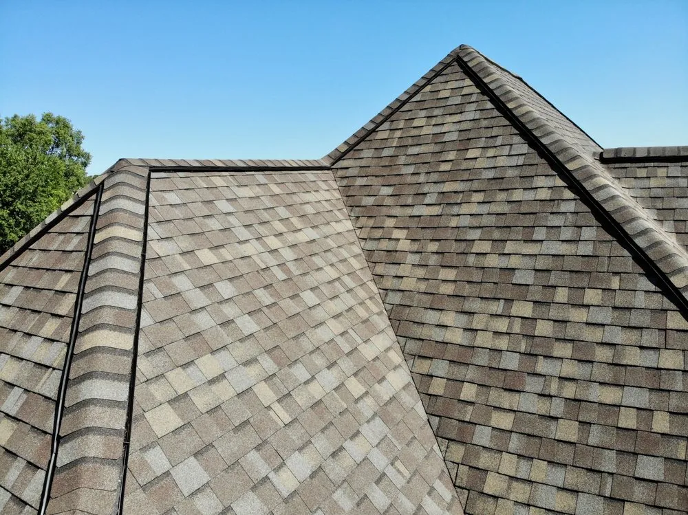Slide of Dennison Roofing & Gutter Toppers