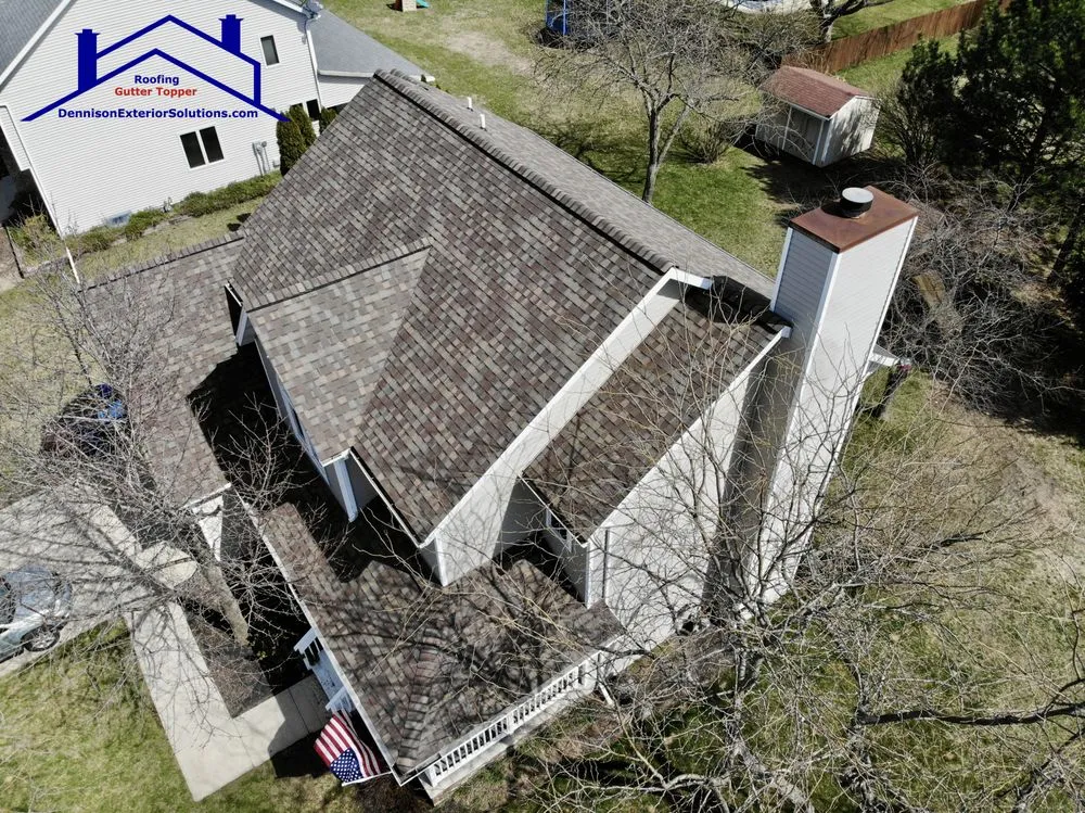 Slide of Dennison Roofing & Gutter Toppers