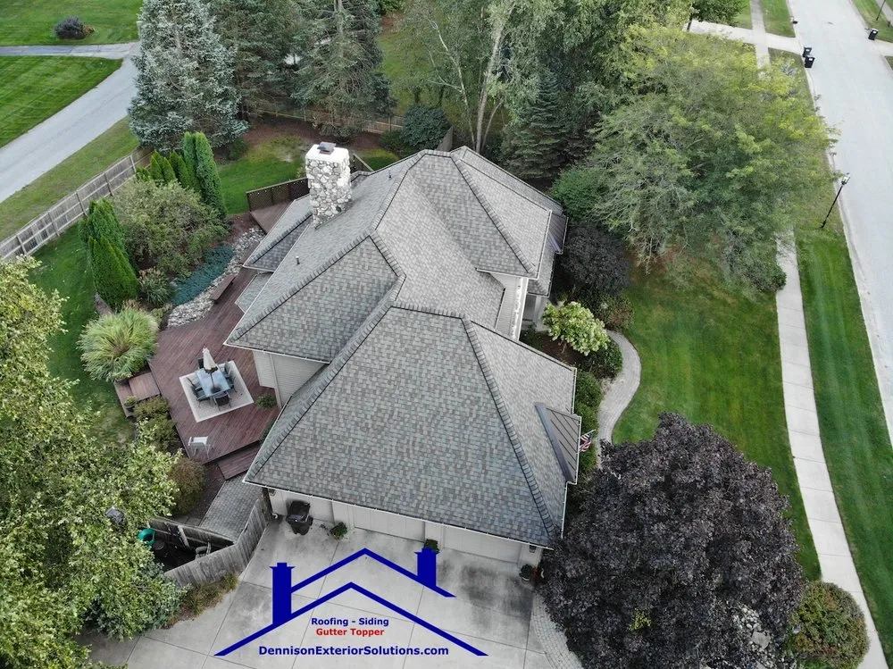 Slide of Dennison Roofing & Gutter Toppers