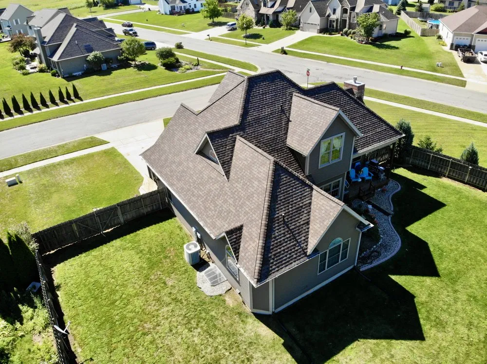 Slide of Dennison Roofing & Gutter Toppers